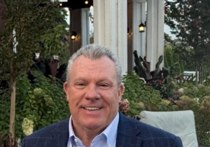Elegant man in front of gazebo